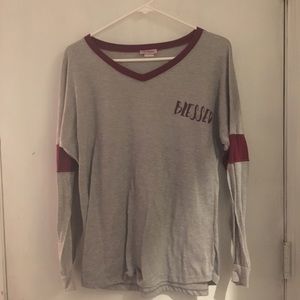 grey and maroon “blessed” shirt